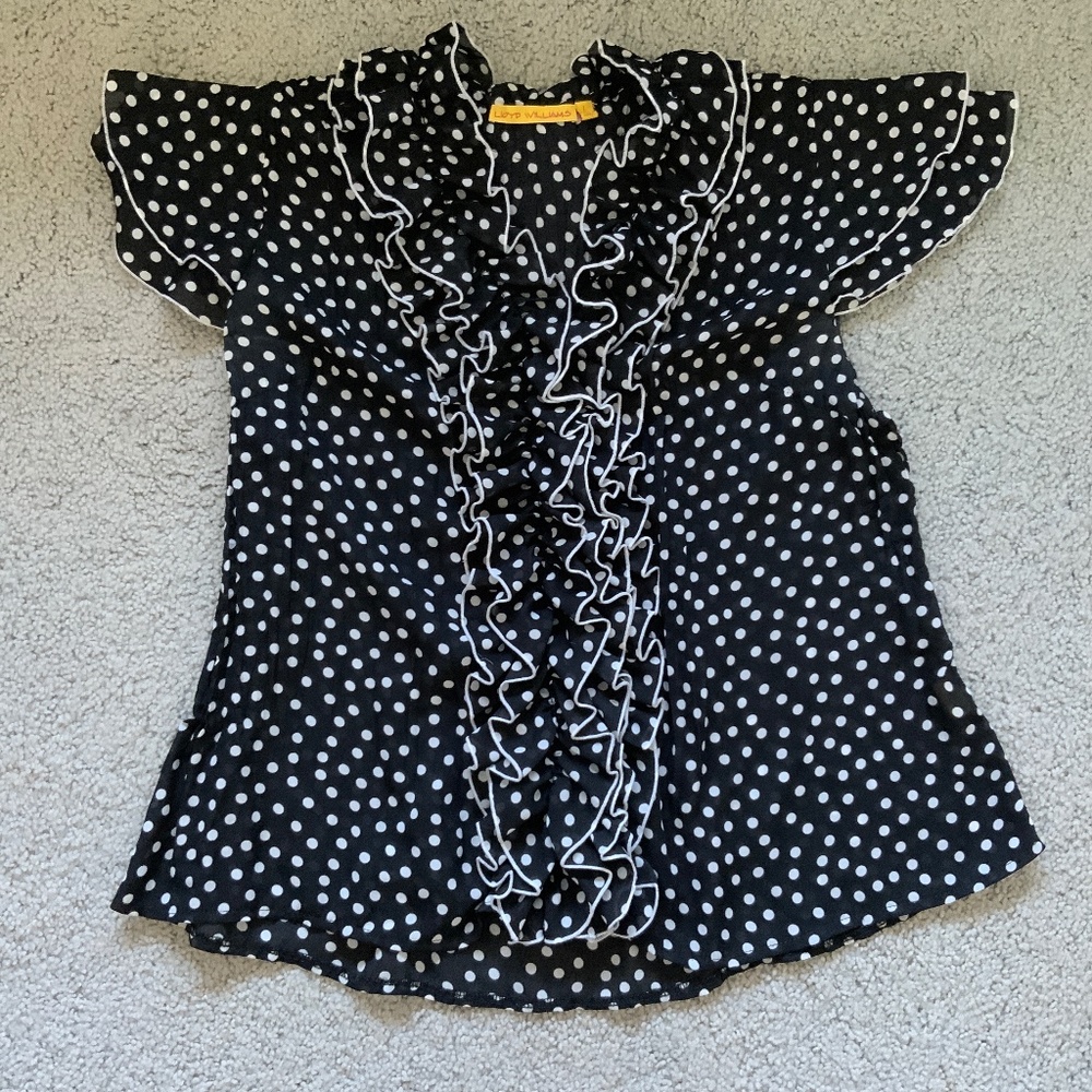 Black and white dotted ruffled top